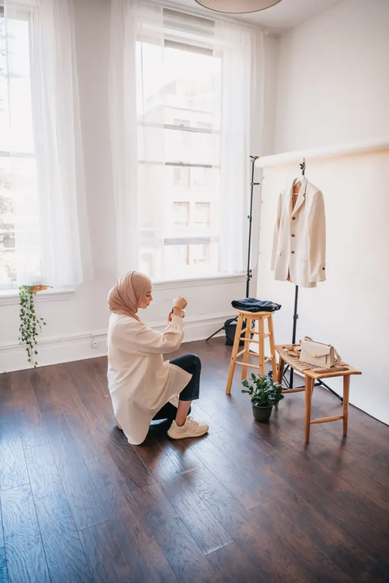 Photographing clothes and a handbag in a bright room.